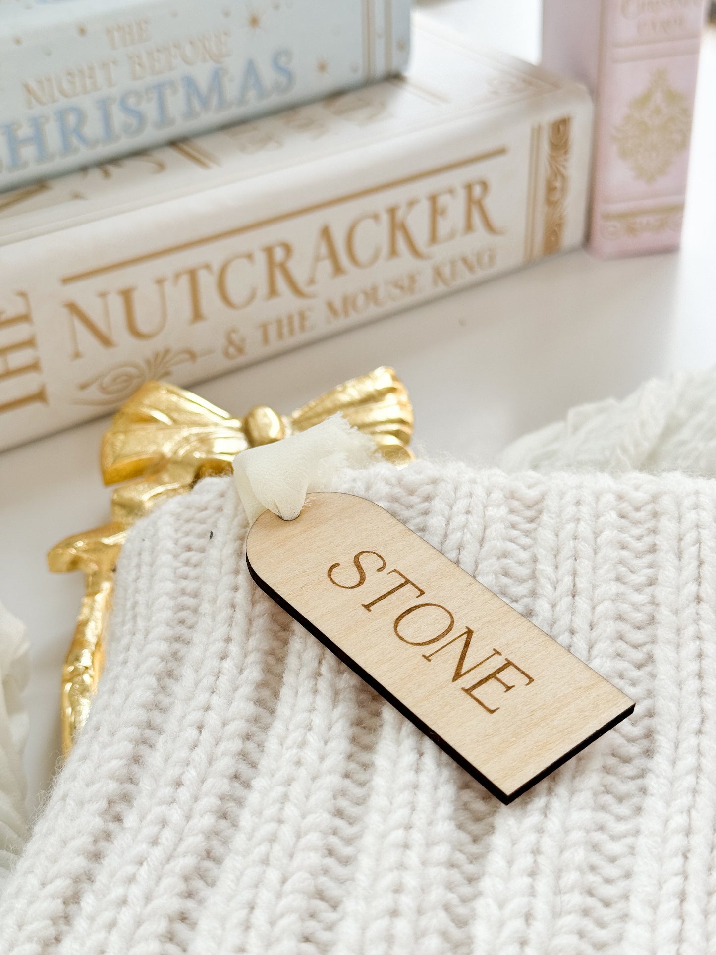 custom wooden christmas tag hanging on stocking