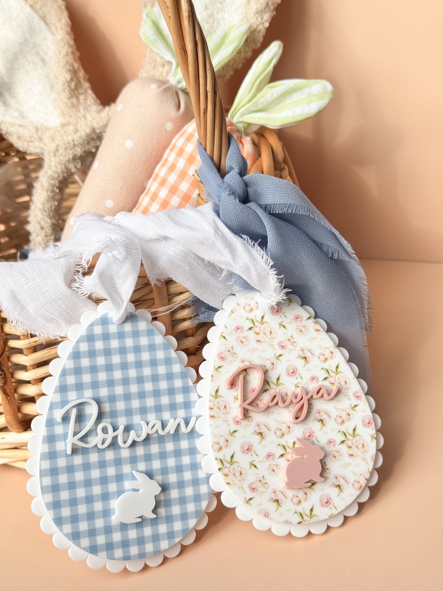 pink and blue acrylic personalized easter tag shaped as easter egg