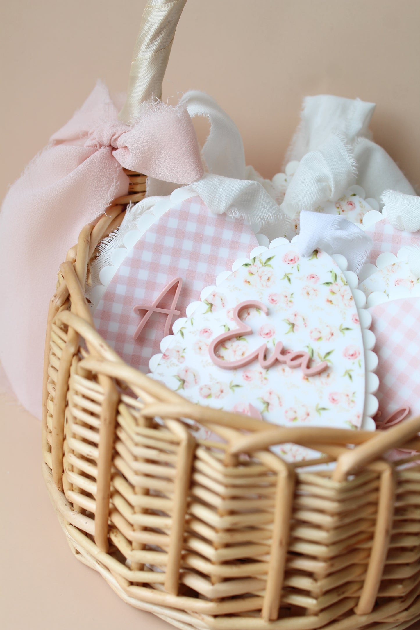 pink and floral acrylic personalized easter tag shaped as easter egg